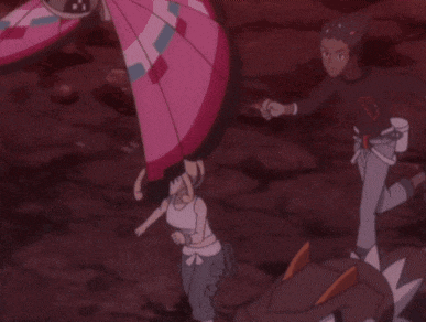 a group of cartoon characters are standing next to each other and one of them is holding a sword .