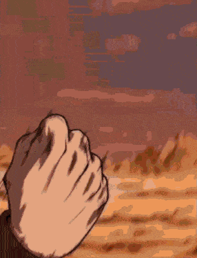 a close up of a person 's fist in a cartoon