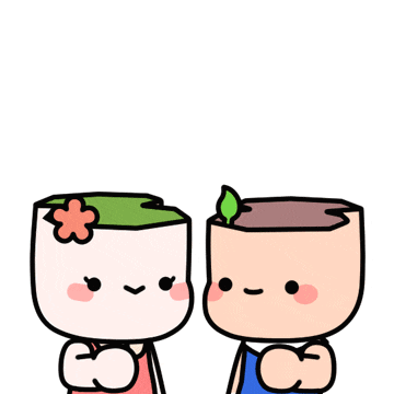 a boy and a girl are hugging each other and holding a heart