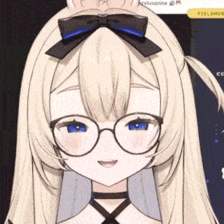 a close up of a girl wearing glasses and a bow in her hair .