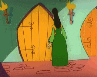 a woman in a green dress is standing in front of a door .