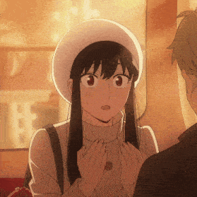 a girl with long black hair is wearing a hat