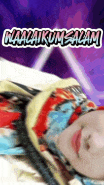 a woman with a scarf around her head and the words waalaikum salam on the bottom