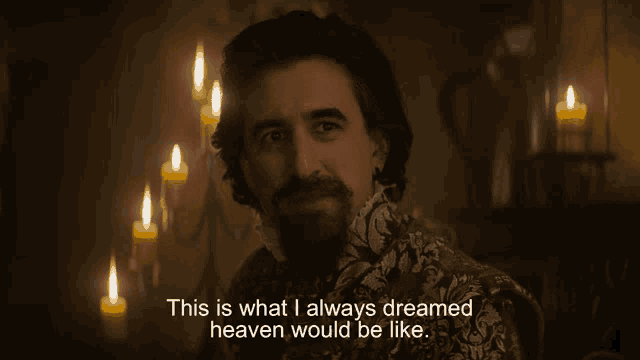 a man says " this is what i always dreamed heaven would be like " in front of candles