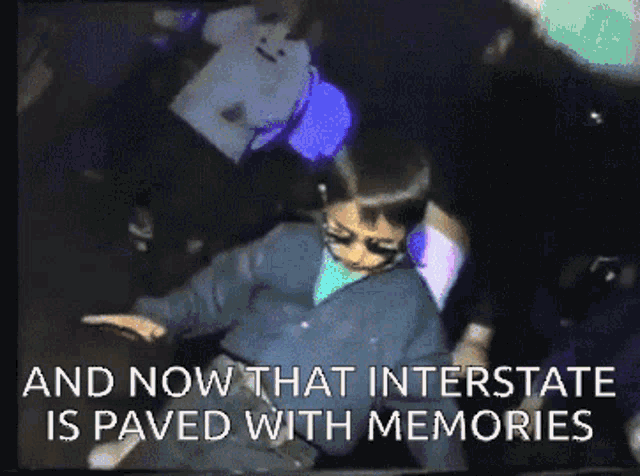 a video of a boy with the words and now that interstate is paved with memories