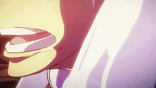 a close up of a person 's mouth with a white tongue sticking out .