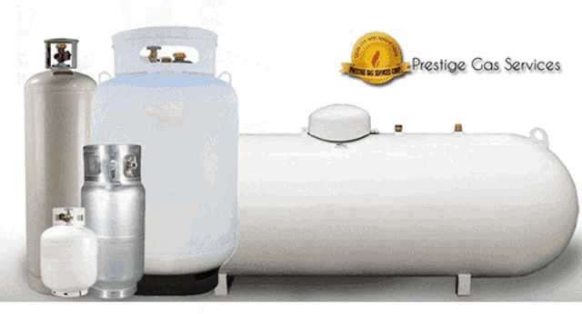 several propane tanks are lined up in front of a sign that says " prestige gas services "