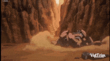 a robot is laying on the ground in the middle of a canyon in the desert .
