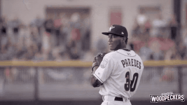 a baseball player with the number 30 on his back