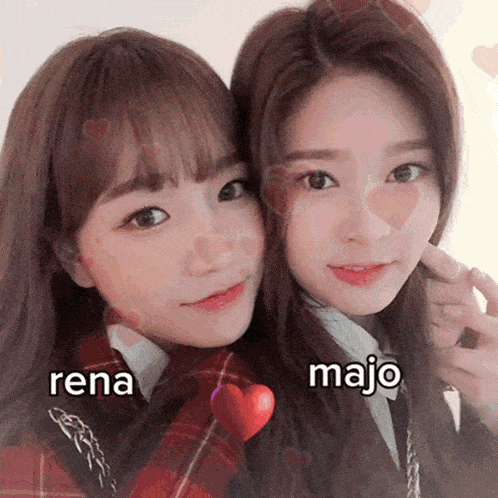 two girls are posing for a picture with rena and majo written above them