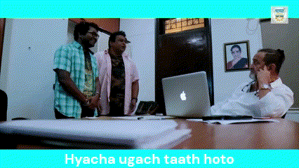 a group of men are standing around a table with an apple laptop and the words hyacha ugach taath hoto below them