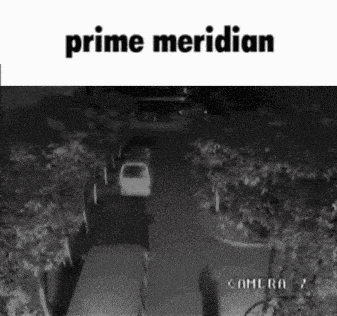 a black and white photo of a car driving down a street with the words `` prime meridian '' above it .