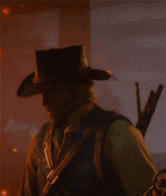 a man in a cowboy hat is holding a gun in his right hand