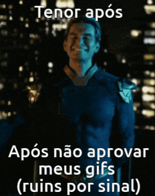 a man in a blue superhero costume is standing in front of a city skyline at night .