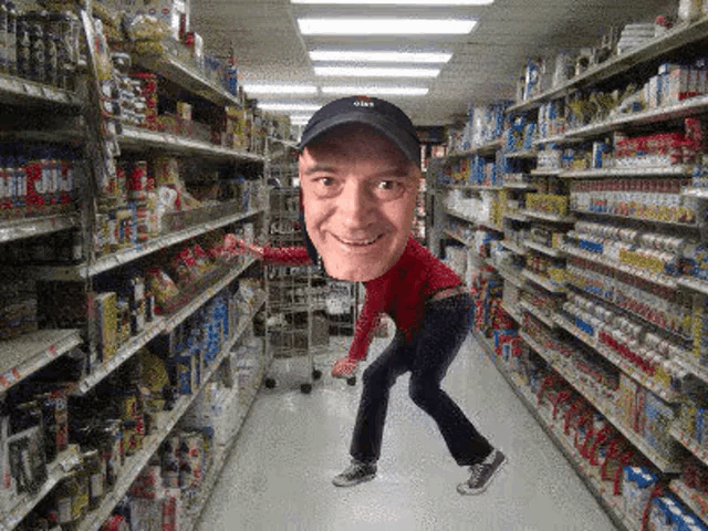 a man in a black hat is standing in a grocery store aisle