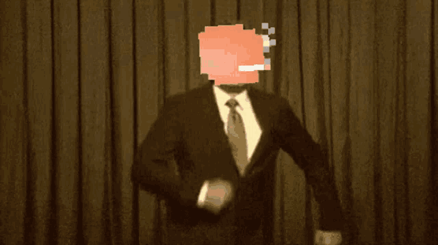 a man in a suit and tie stands in front of a curtain with the words let 's go on it