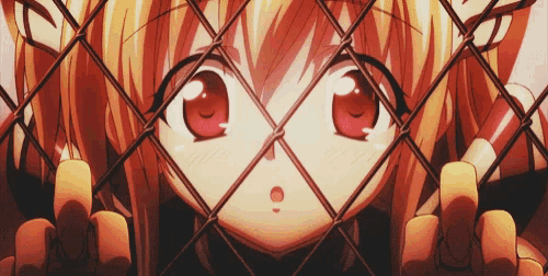 a girl behind a chain link fence with red eyes