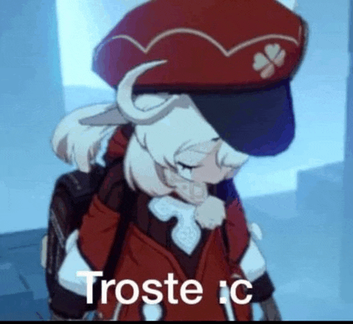 a cartoon character is wearing a red hat with a clover on it and is crying .