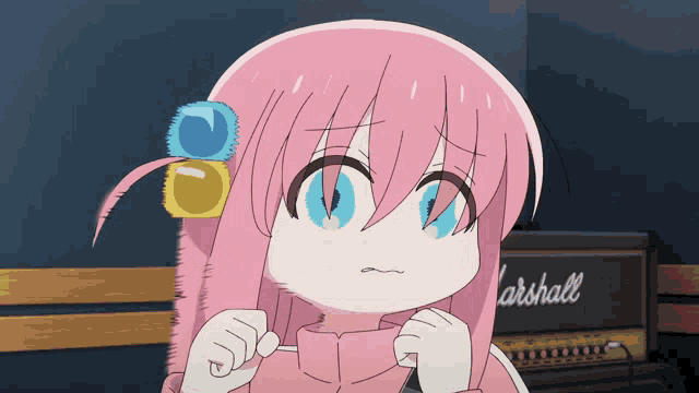 a girl with pink hair is standing in front of a marshall guitar amplifier
