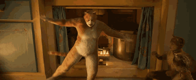 a man in a fox costume is standing in a room