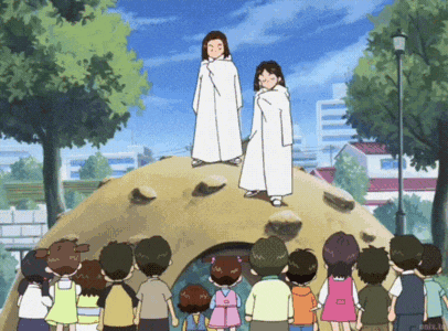 a group of children are standing in a park watching two cartoon characters standing on a hill