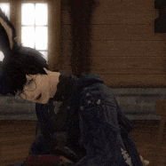 a man with bunny ears and glasses is sitting in a room