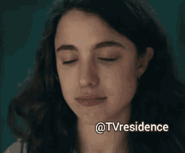 a close up of a woman 's face with a caption that says ' @tvresidence ' on it