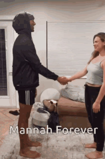 a man and a woman shaking hands with the words mannah forever below them
