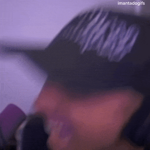 a blurry picture of a person wearing a hat
