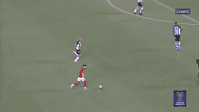 a soccer game is being played on a live fc screen