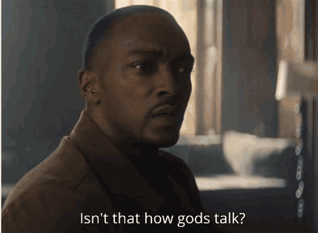 a close up of a man with the words isn 't that how gods talk