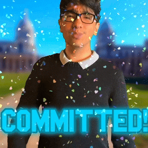a man wearing glasses and a black sweater is surrounded by confetti and the words committed in blue letters