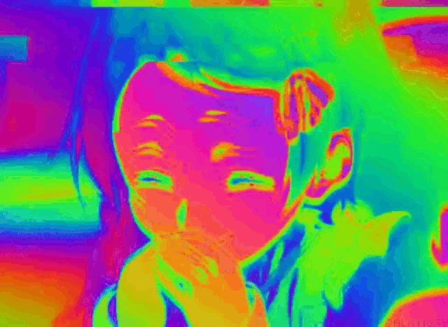 a colorful image of a girl laughing with a glitch effect .