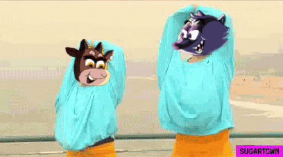 two cartoon characters are standing next to each other .