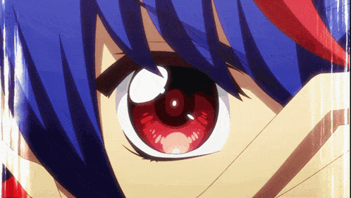 a close up of a person 's eye with a blue hair