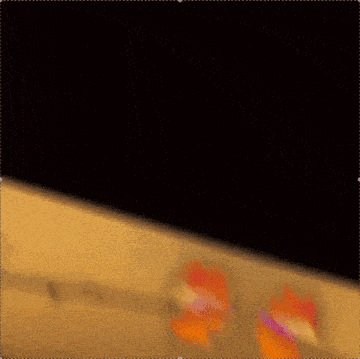 a blurred image of a building with a sign that says ' a ' on it