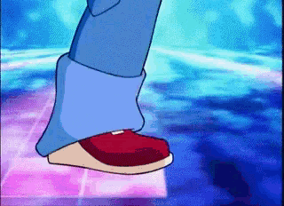 a pixelated image of a person 's feet walking on a dance floor
