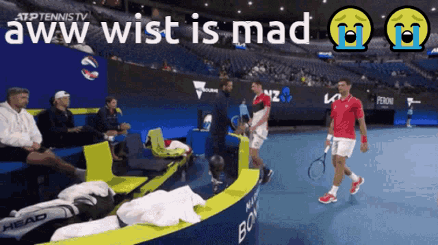 a man holding a tennis racquet on a tennis court with the words aww wist is mad