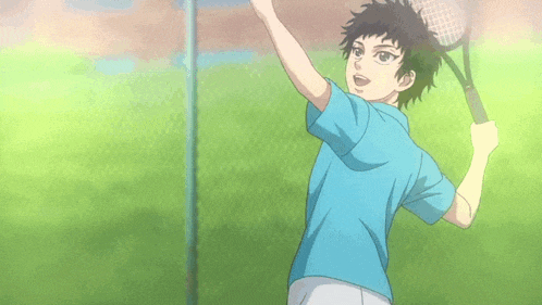 a young boy is holding a tennis racquet on a tennis court