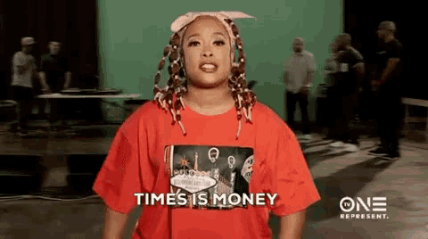 a woman in a red t-shirt says times is money