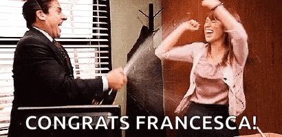a man and a woman are celebrating with champagne in their hands .