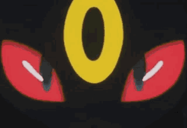 a close up of a yellow circle with two white eyes .