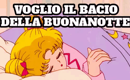 a picture of a girl sleeping with the words " voglio il bacio della buonanotte " above her