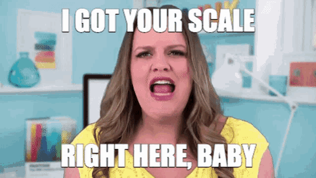 a woman in a yellow shirt is screaming with the words i got your scale right here baby above her