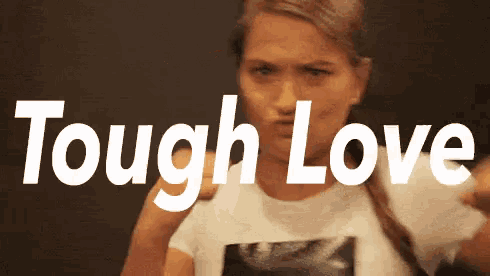 a woman making a face with the words tough love behind her