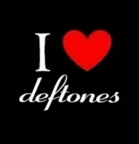 a sign that says i love deftones with a red heart in the middle