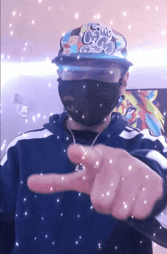a man wearing a mask and a hat that says gnc3