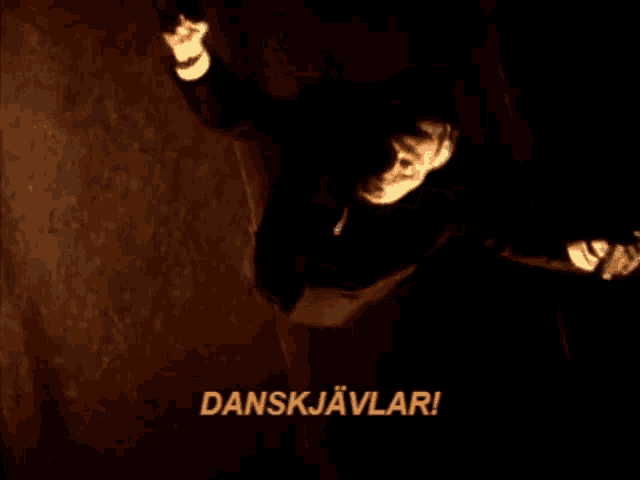 a man is flying through the air with the words danskjavlar written on the bottom