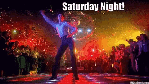 a man is dancing in front of a disco ball with the words saturday night written below him