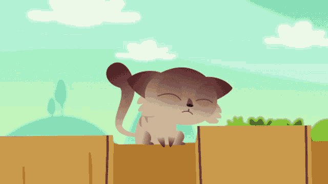 a cat is jumping over a wooden fence